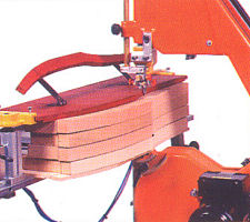 woodworking bandsaw cutting through wood using template