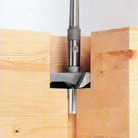 Drill bit with centering pin